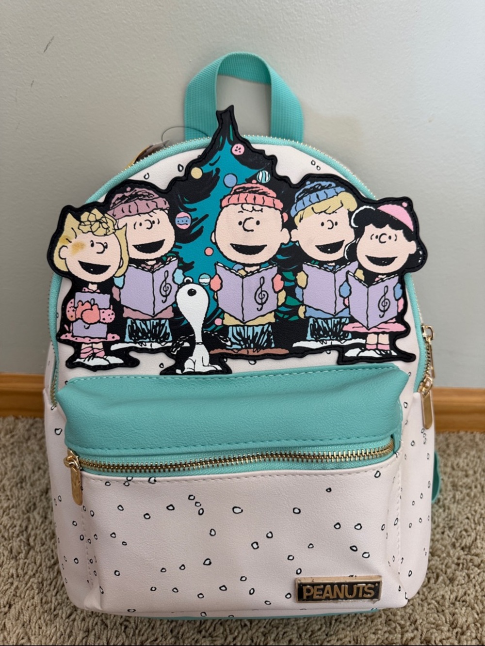 NWT Peanuts "A Charlie Brown Christmas" Caroling Small Backpack by BioWorld
